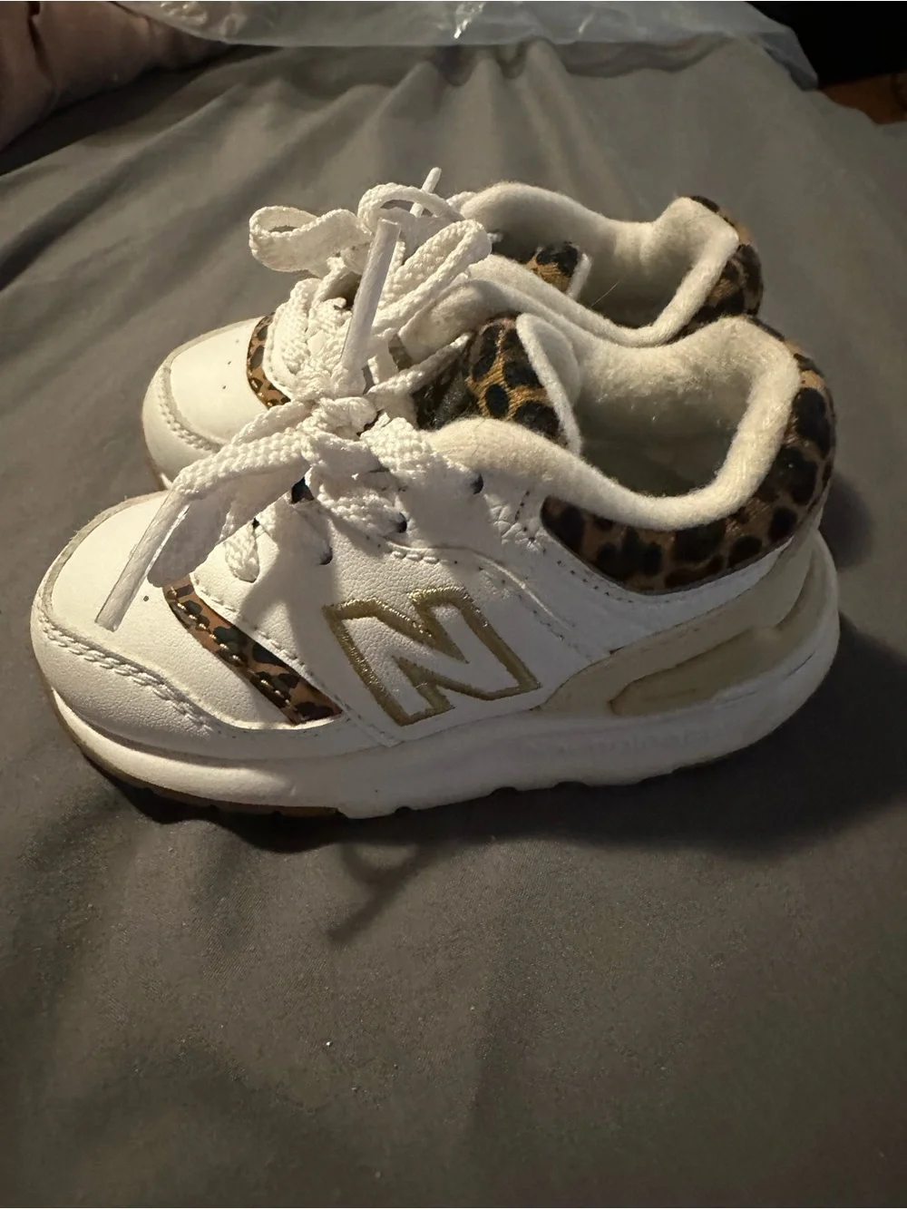 New Balance Kids White Sneakers with Leopard Trim and Gold N